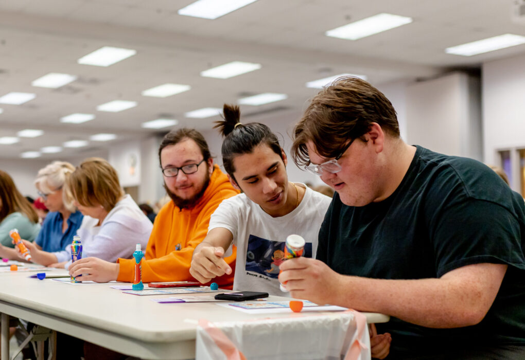 Young men playing bingo